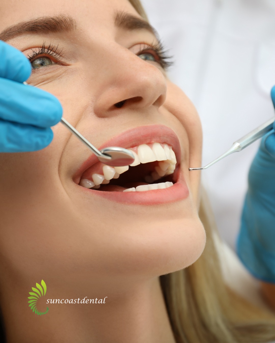 Patient getting teeth checked
