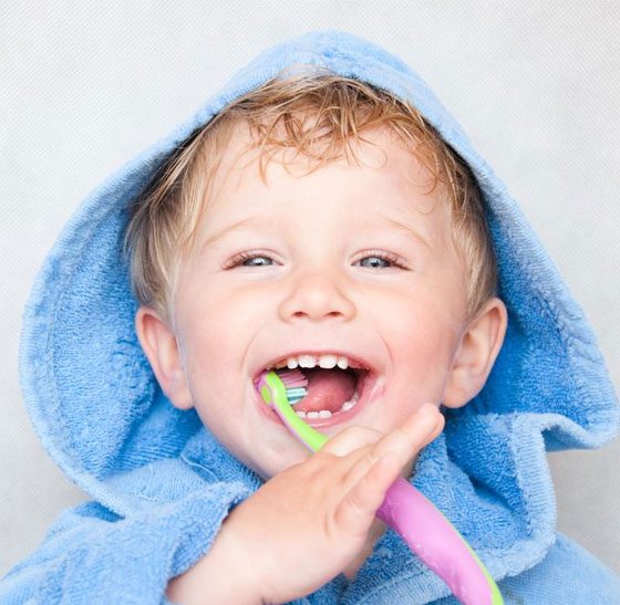 Baby Cleaning His Teeth — Suncoastdental In Maroochydore, QLD